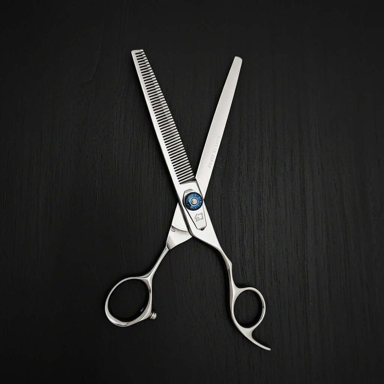 Hair thinning scissors on a black background