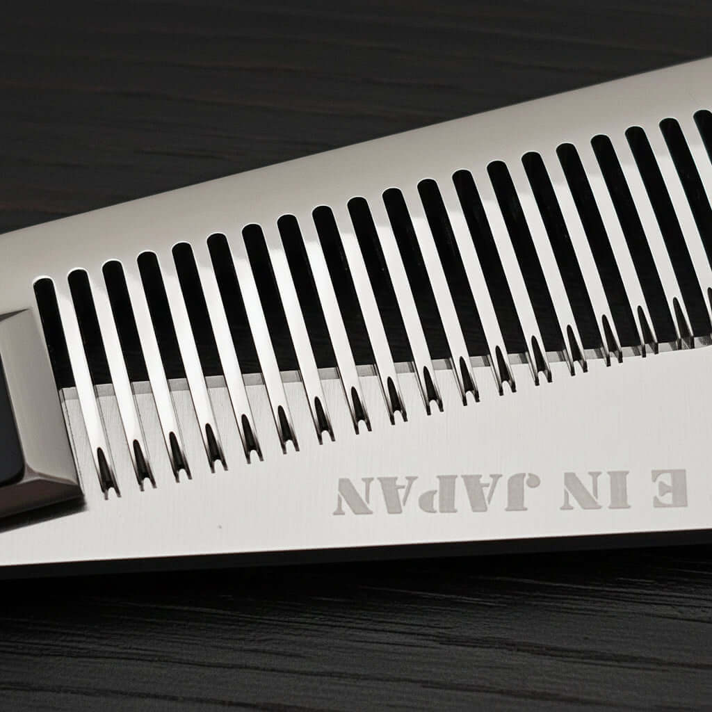 Close-up of hair thinner blades with 'Made in Japan' text on a dark wooden surface