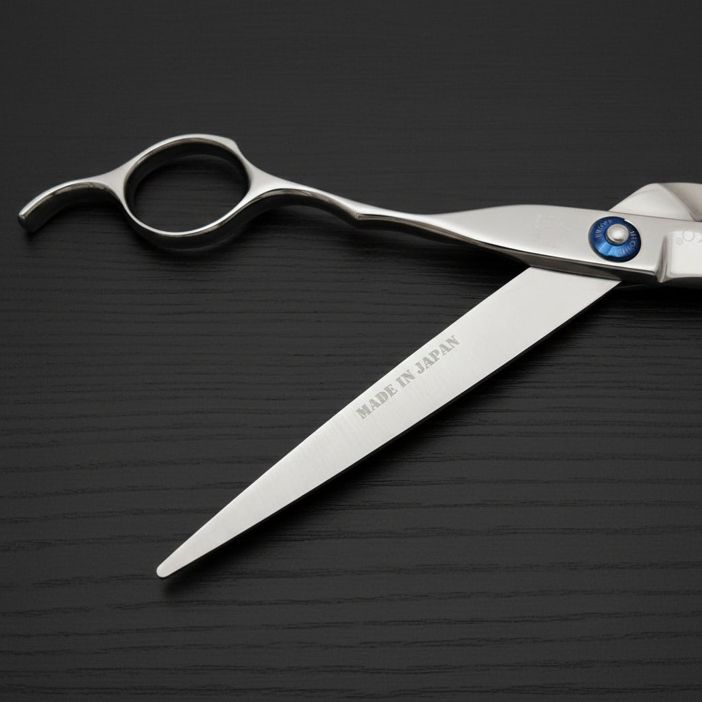 Hair cutting shears with 'Made in Japan' text on a black background