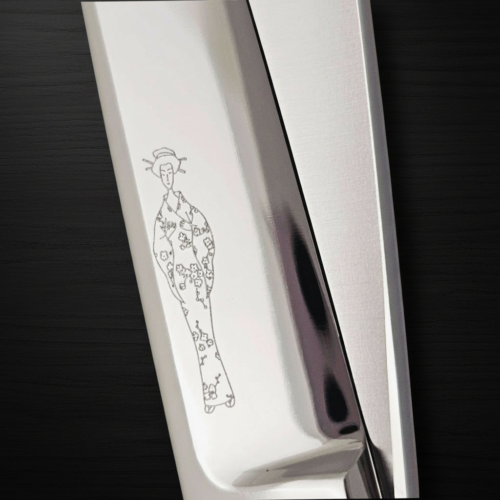 Silver swivel hair scissors with engraved Japanese ladydesign on a black background