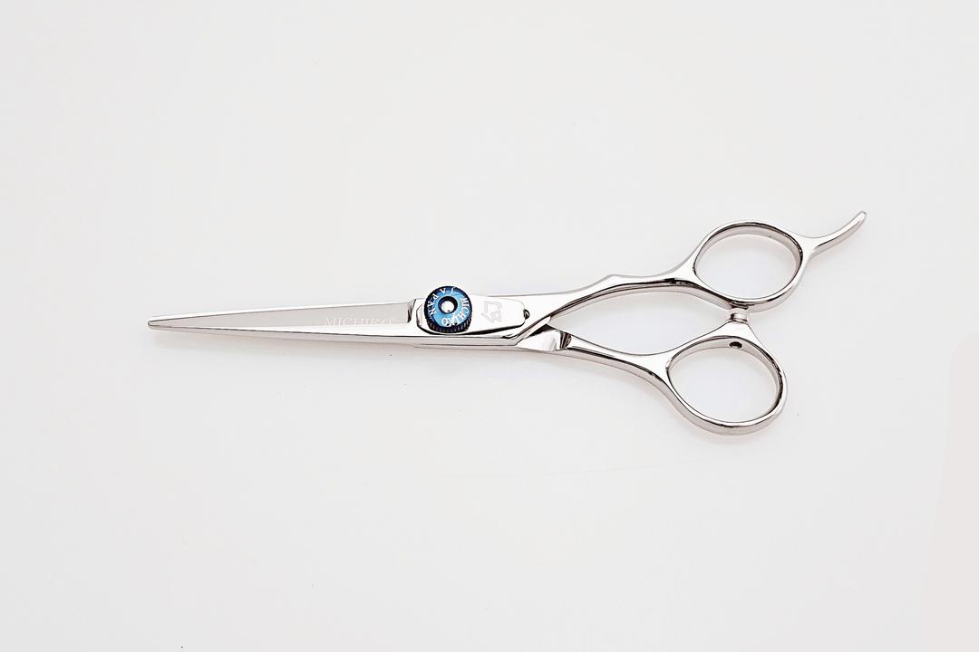 Hair cutting scissors on a white background