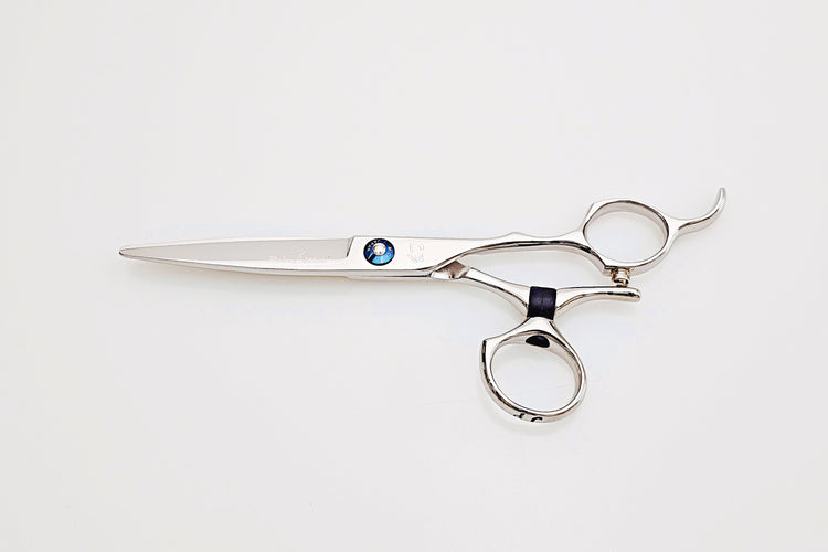 Swivel hair-cutting scissors on a white background