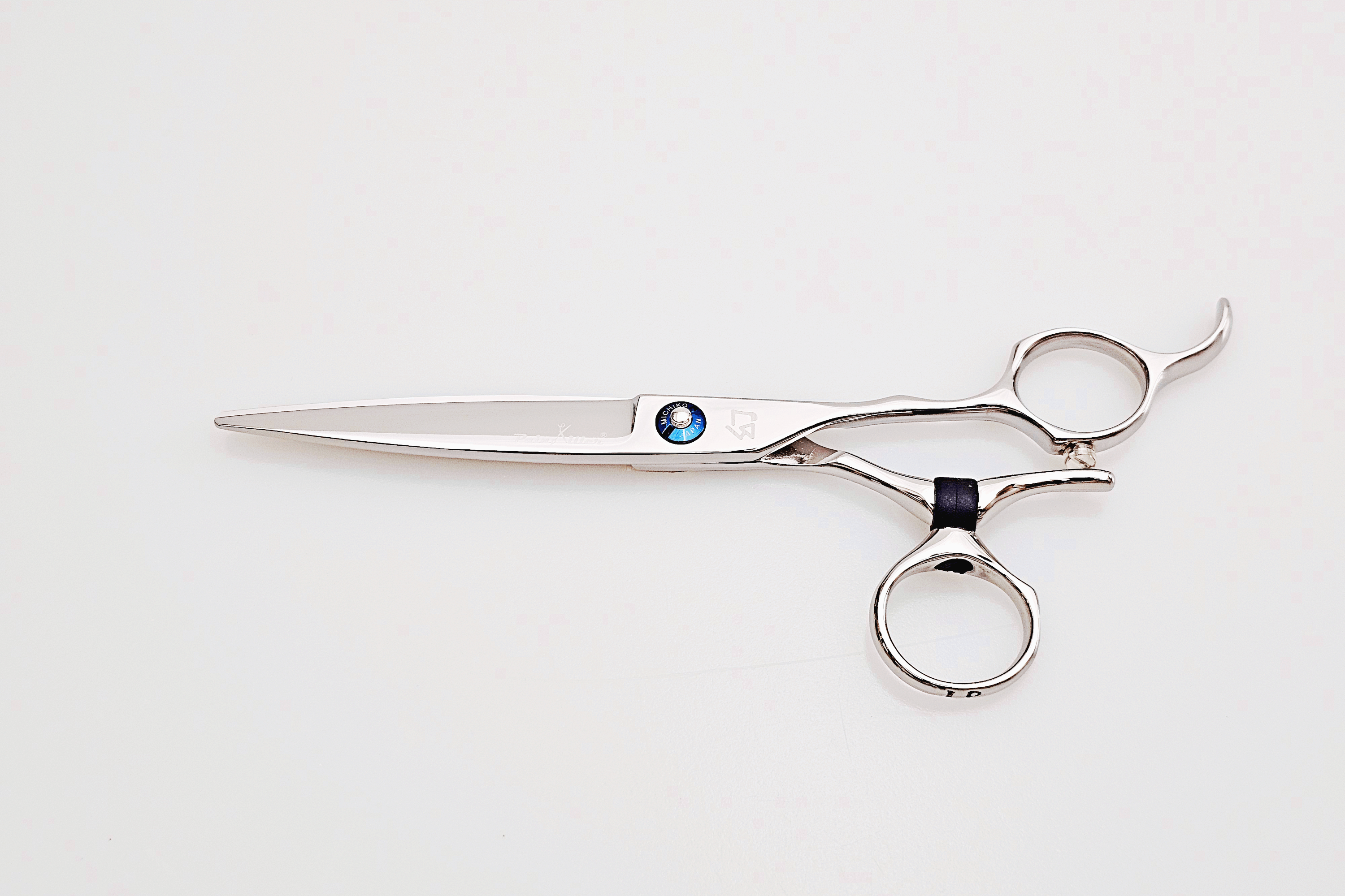 Swivel hair scissors on a white background