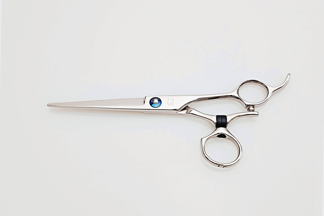 Swivel hair cutting scissors on a white background