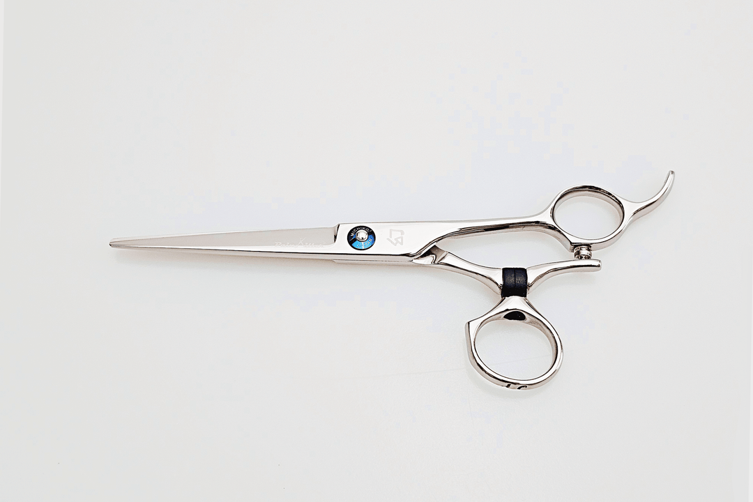 Swivel hair cutting scissors on a white background