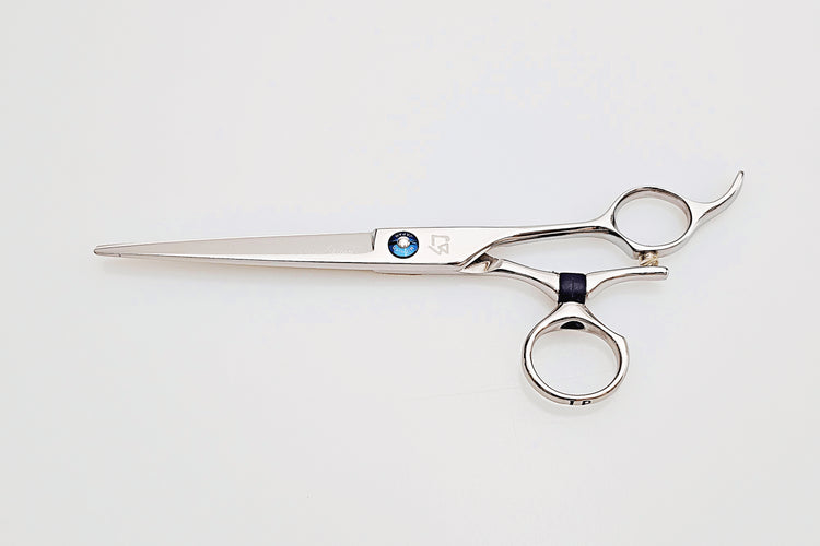 Swivel hair cutting scissors on a white background