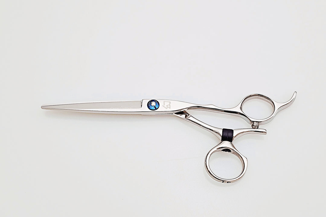 Swivel hair cutting scissors on a white background