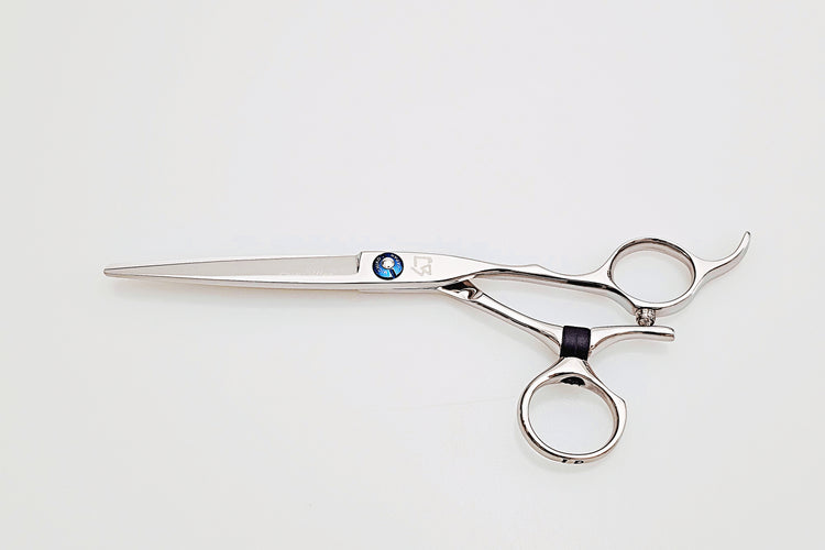 Swivel hair cutting scissors on a white background