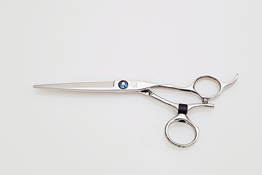 Swivel hair cutting scissors on a white background