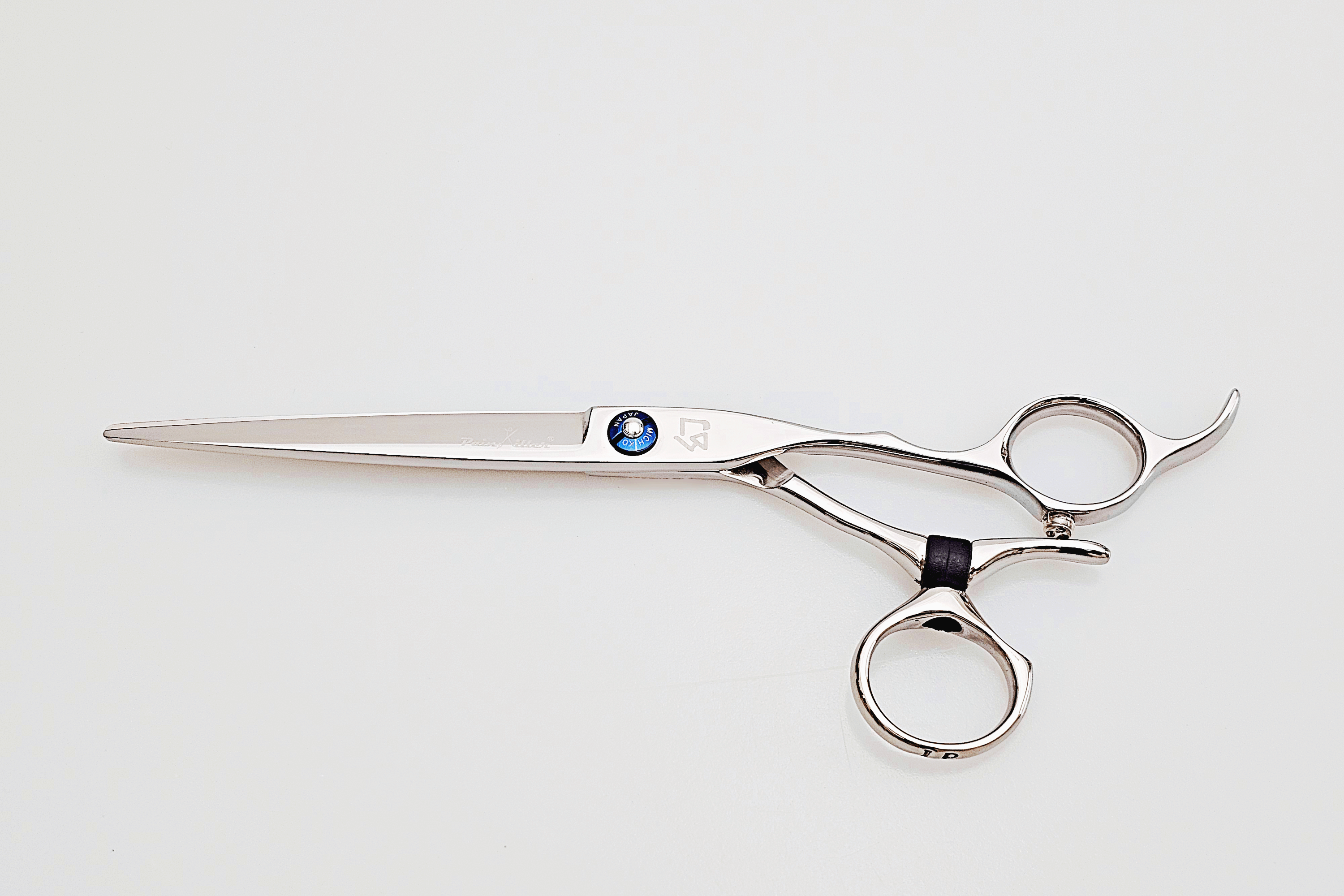 Swivel hair scissors on a white background