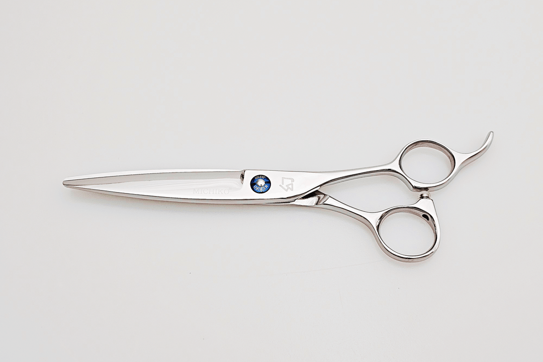 Hair scissors with a brand logo on a white background