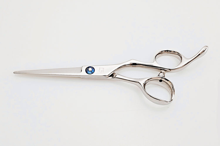Barber shears on a white surface