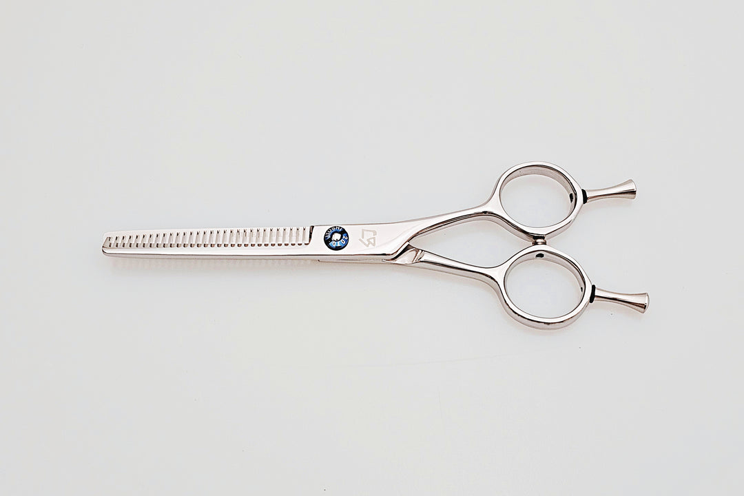 Hair thinning scissors on a white background