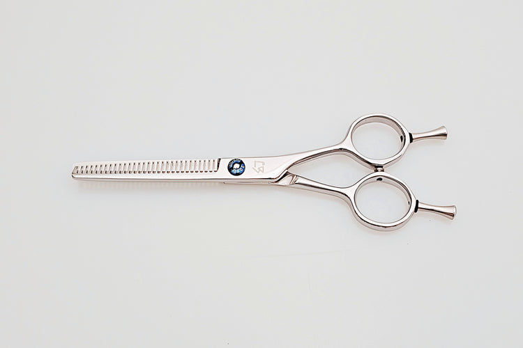 Hair thinning scissors on a white background