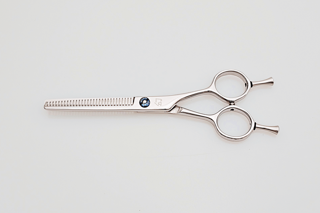 Hair thinning scissors on a white background