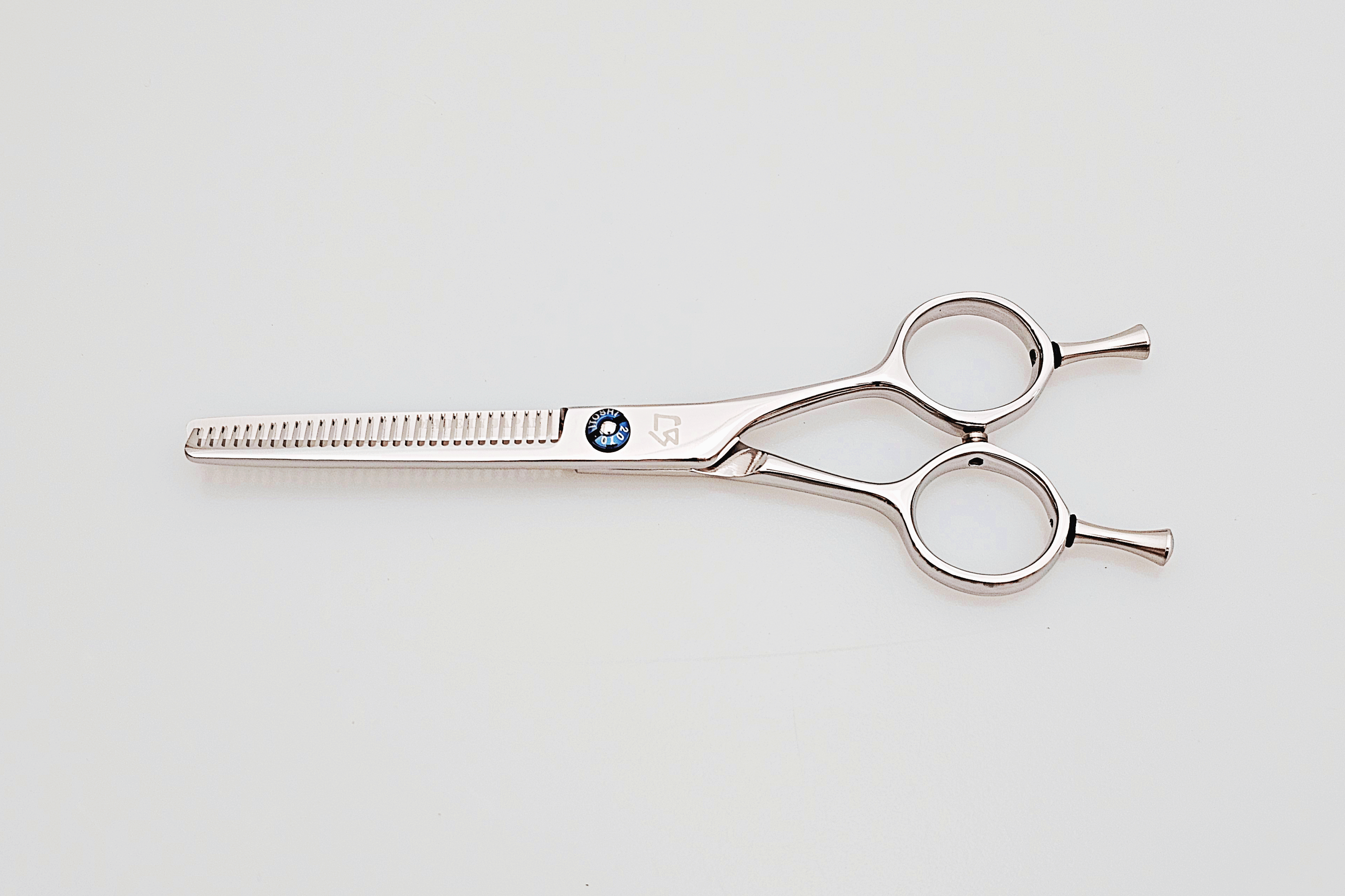 Hair thinning scissors on a white background
