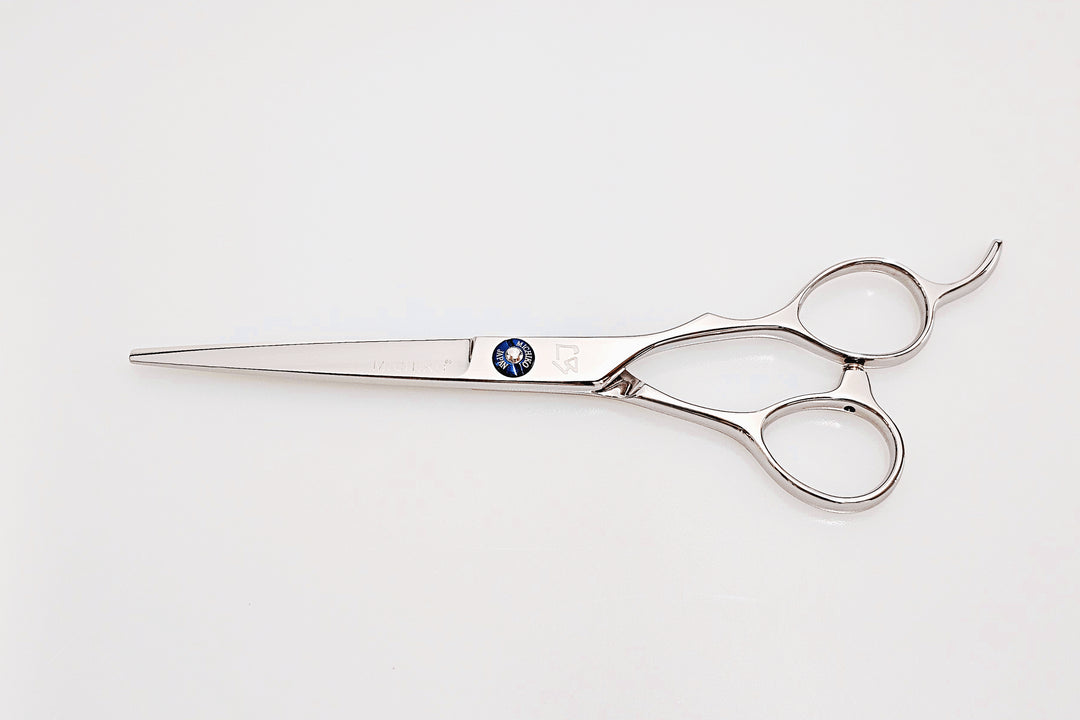 Hair cutting scissors with a brand logo on a white background