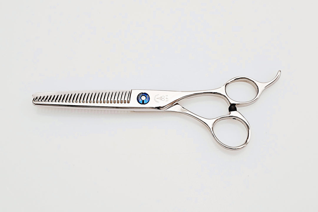 Hair thinning scissors on a white background