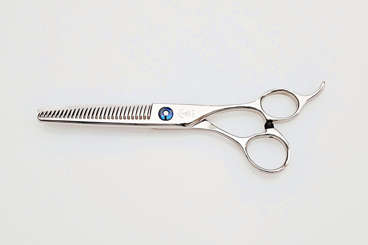 Hair thinning scissors on a white background