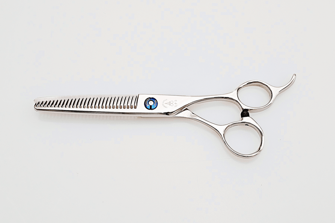 Hair thinning scissors on a white background