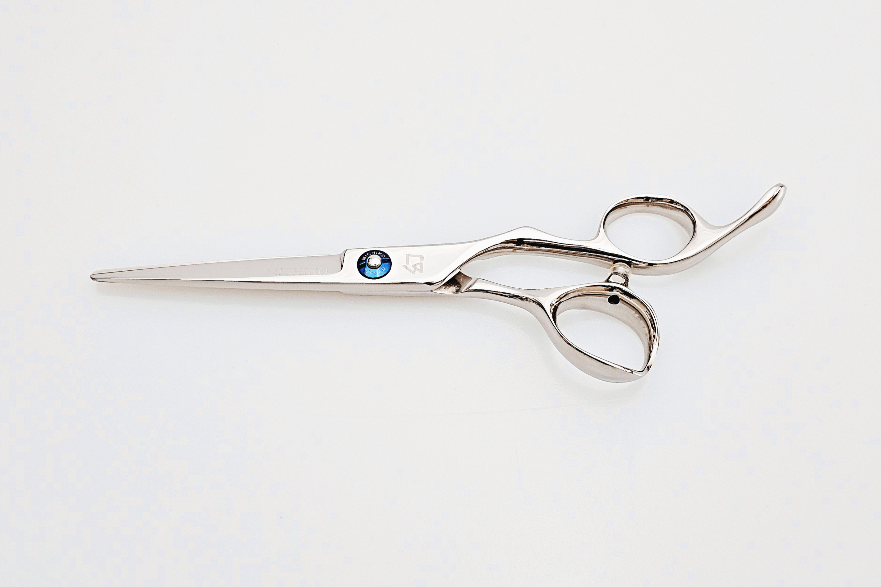 Hair scissors on a white background