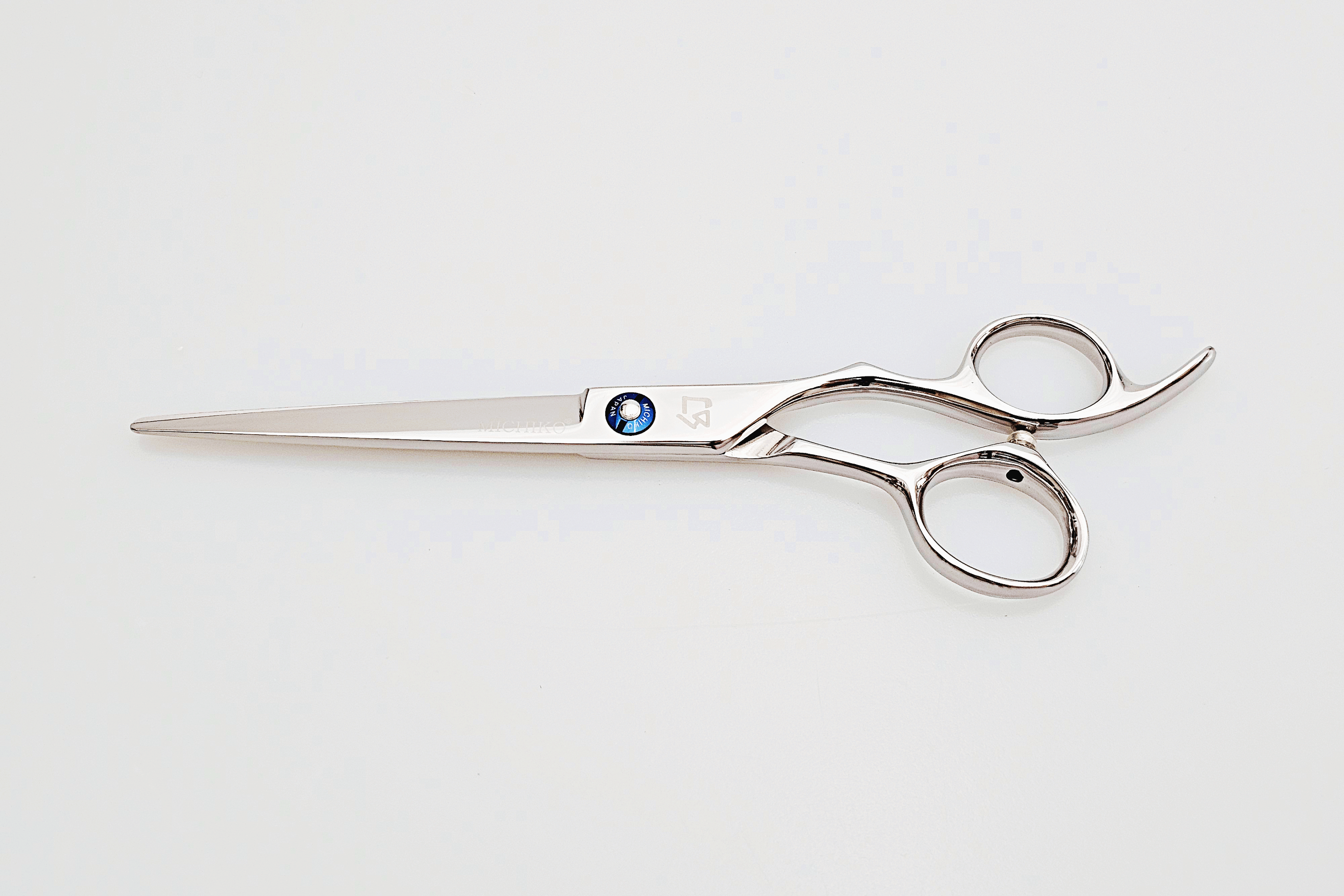 Hair cutting scissors on a white background