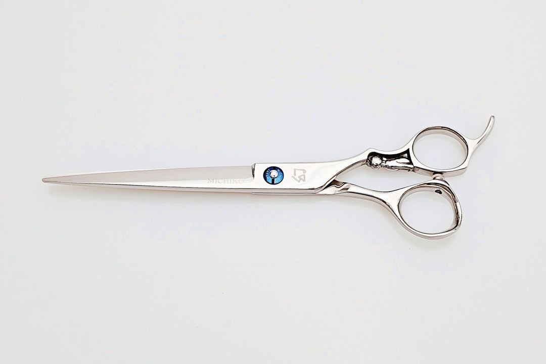Hair scissors with a brand logo on a white background