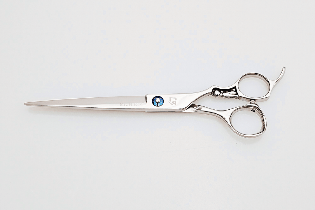 Hair scissors with a brand logo on a white background
