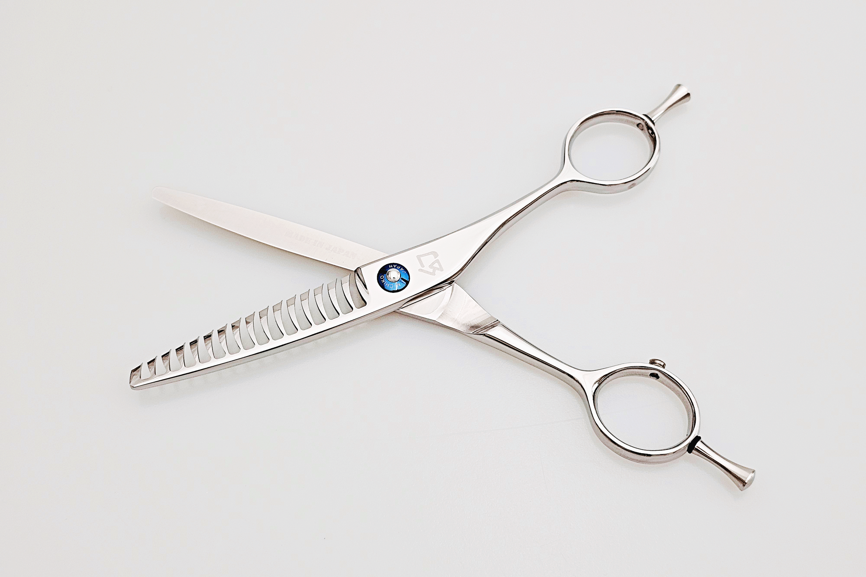 Hair texturizing shears on a white background