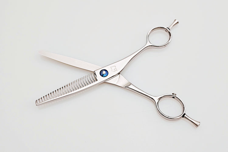 Hair scissors with a blue logo on a white background