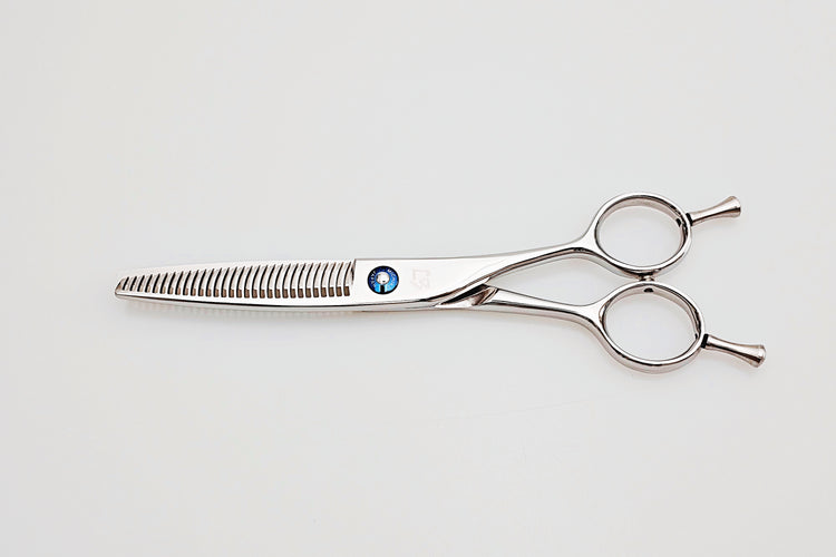 Hair cutting shears on a white background