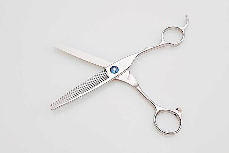 Hair thinning shears on a white background