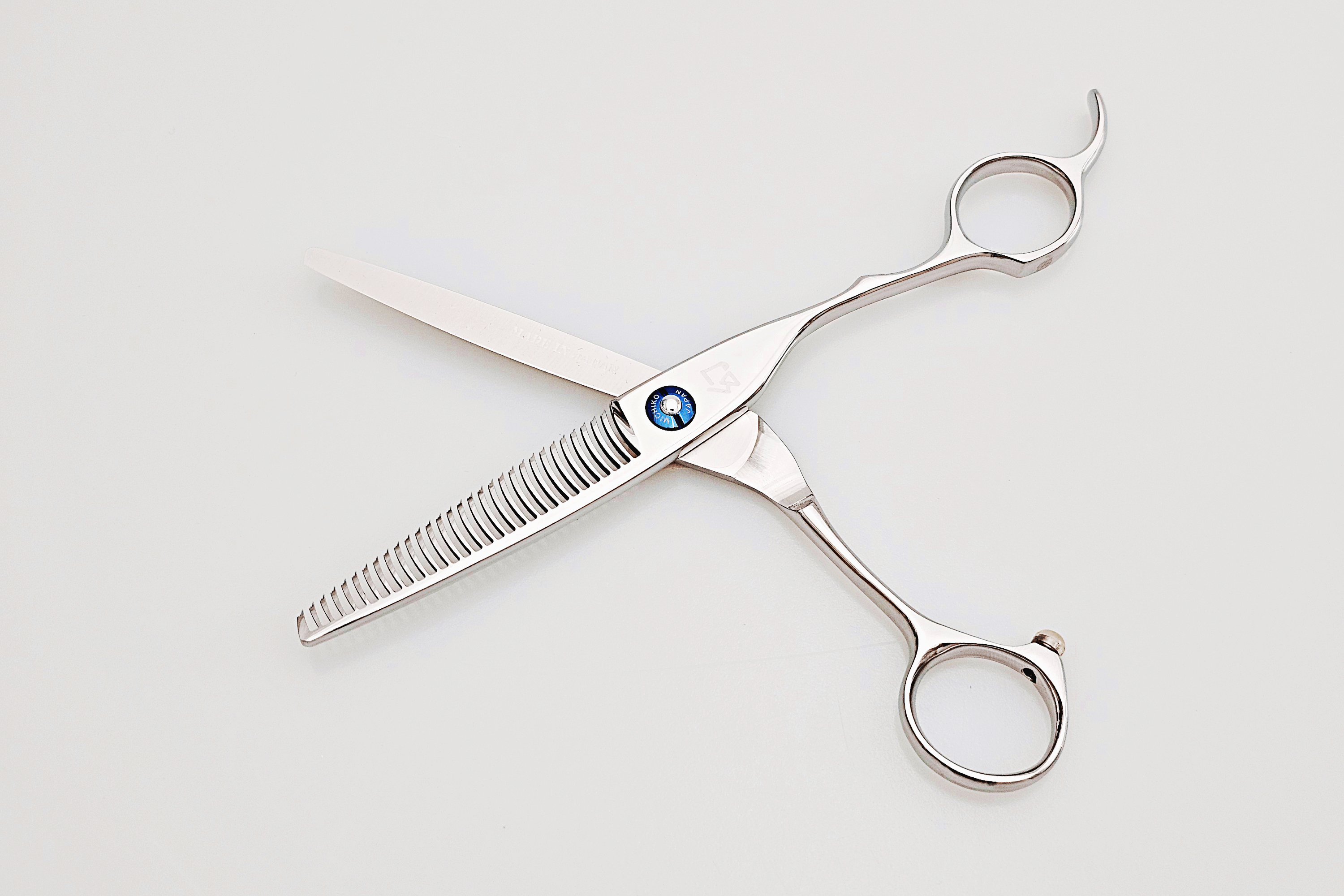 Hair thinning shears on a white background