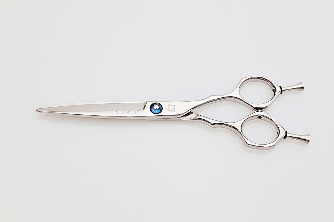 Hair scissors with a brand logo on a white background
