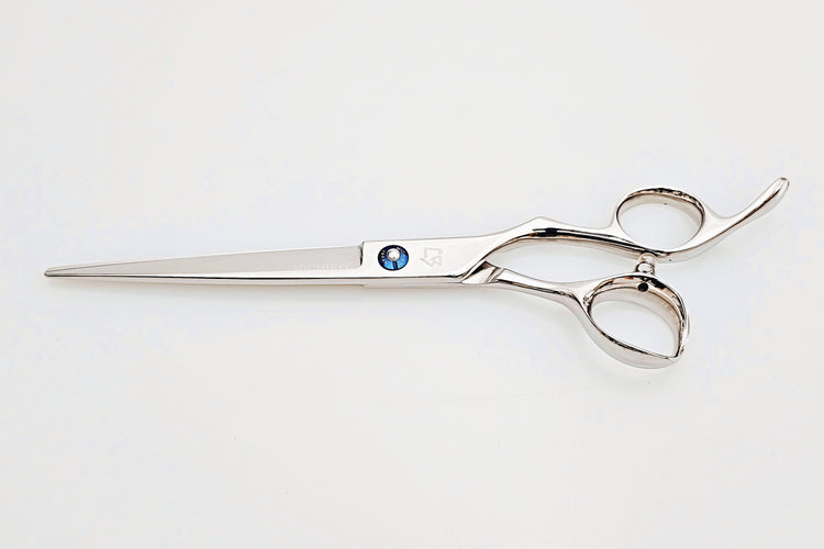 Barber shears on a white background