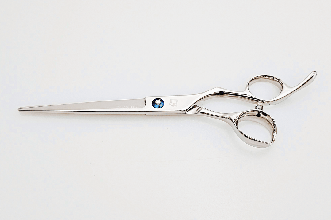Barber shears on a white background