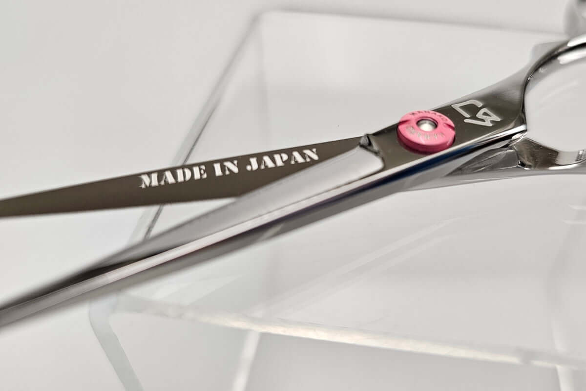 Hair cutting shears with 'Made in Japan' text on a white background