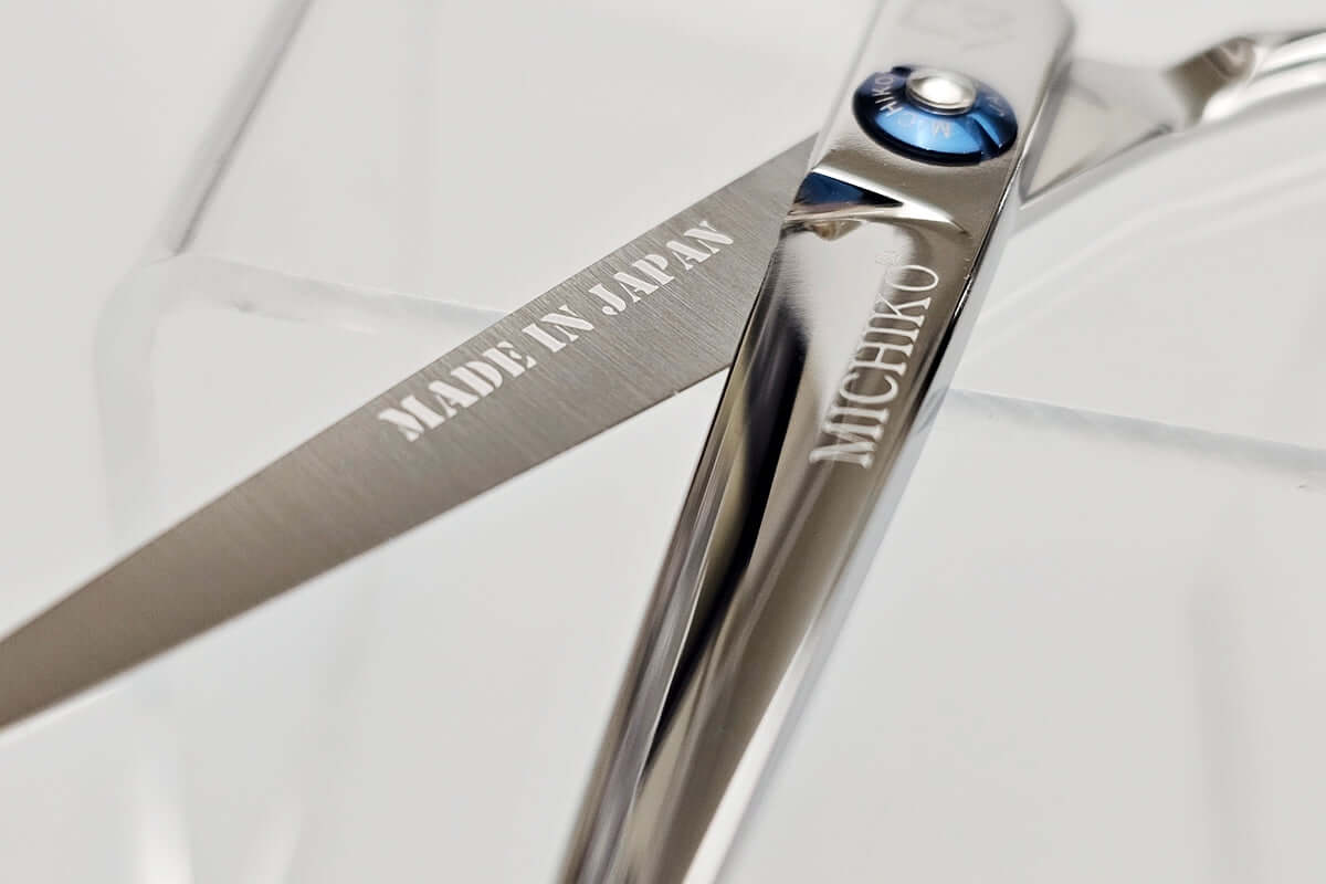 Close-up of a Michiko hair scissors with 'Made in Japan' text on a white background