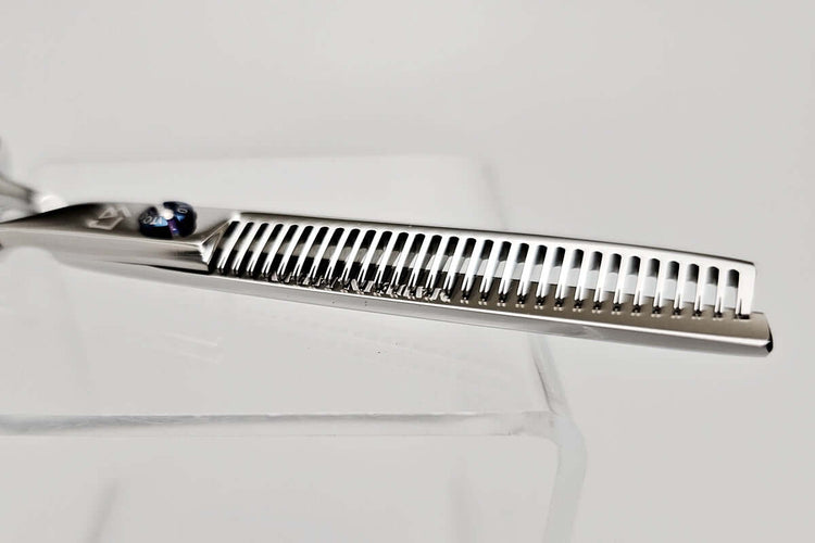Hair thinning scissors on a white background