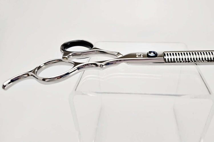Hair thinning scissors on a white background