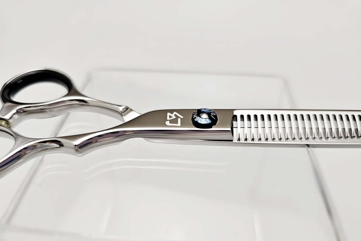 Hair thinning shears on a white background