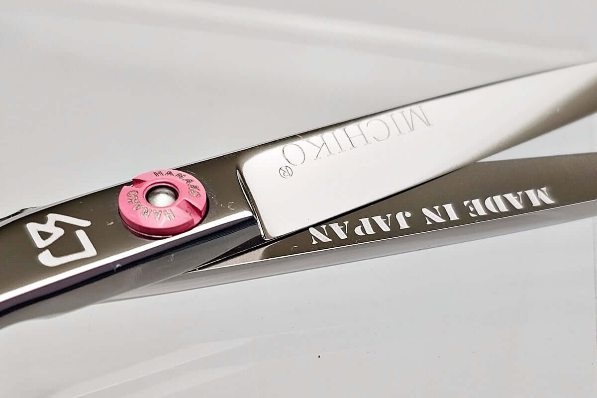 Close-up of hair scissors with Made in Japan engraved on a blade