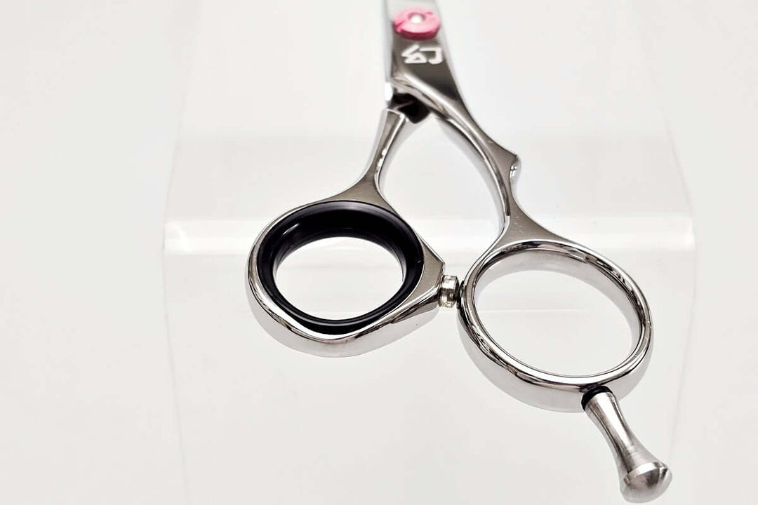 Hair cutting shears on a white background