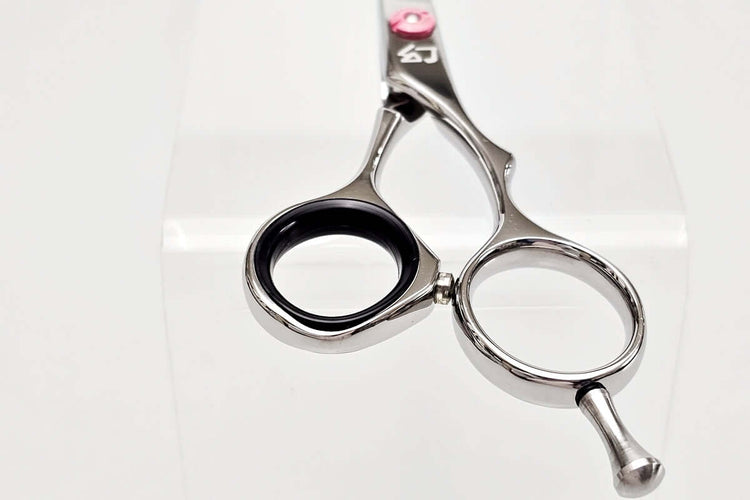 Hair cutting shears on a white background
