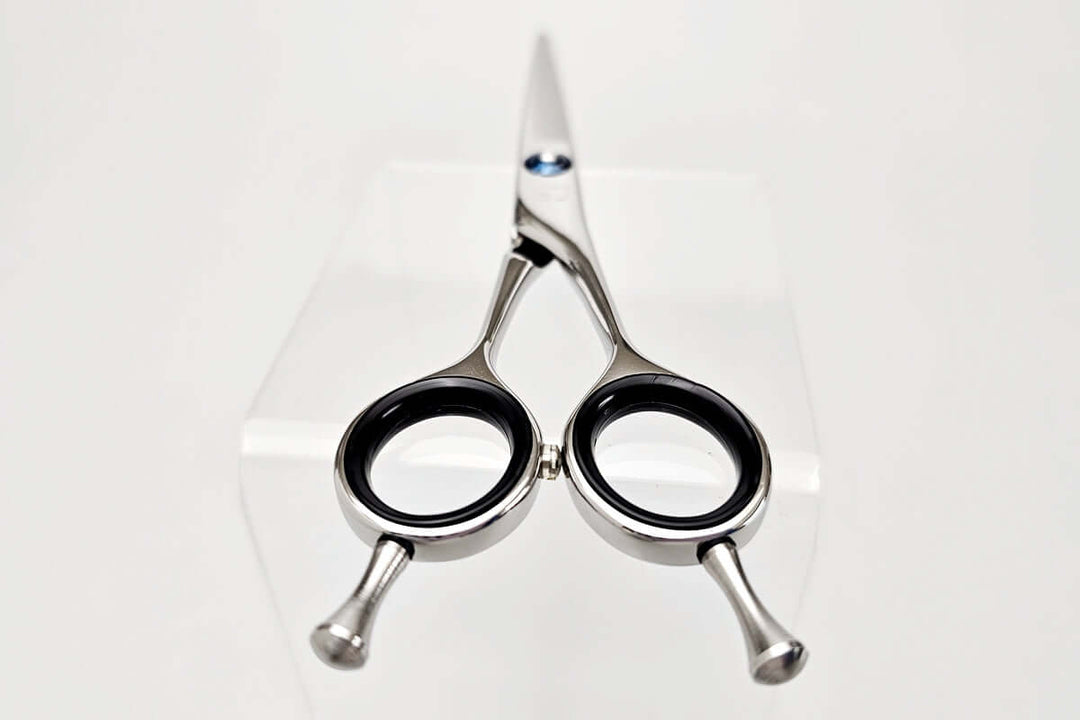 Hair cutting shears on a white background