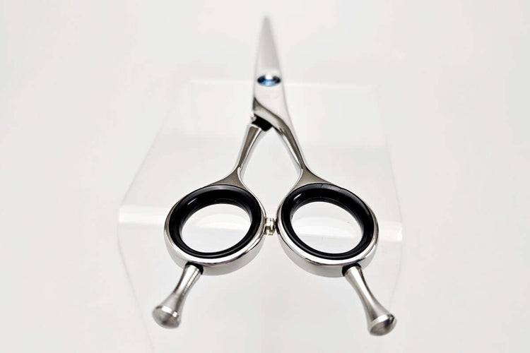 Hair cutting shears on a white background