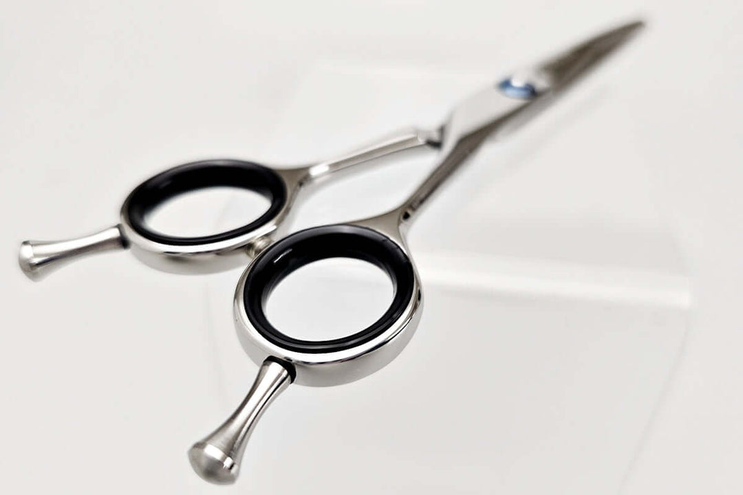 Hair cutting shears on a white background