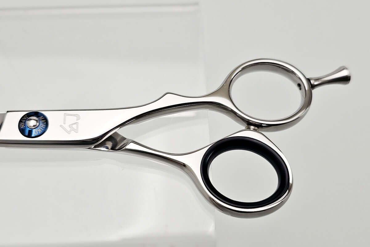 Hair scissors with the MICHIKO brand logo on a light gray background