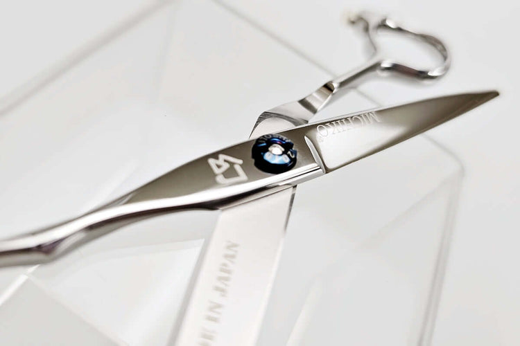 Hair scissors with MICHIKO logo on a white background