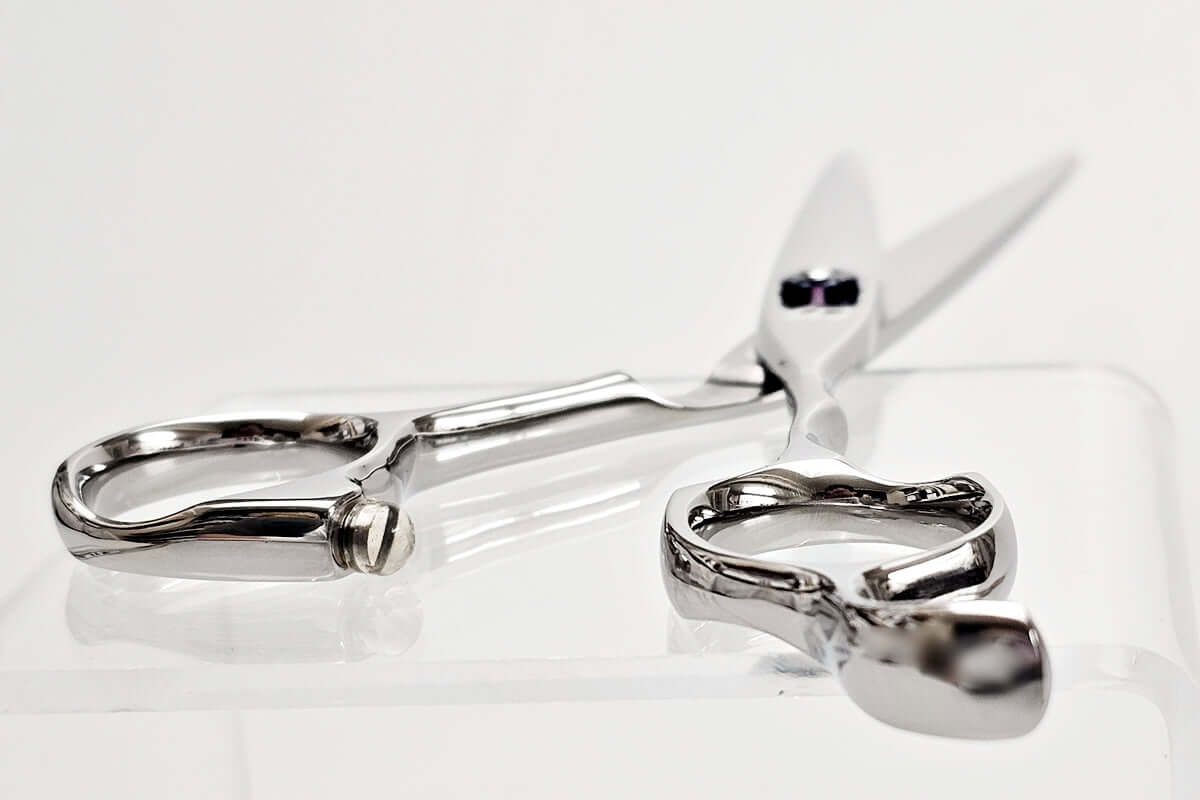 Hair scissors on a white background